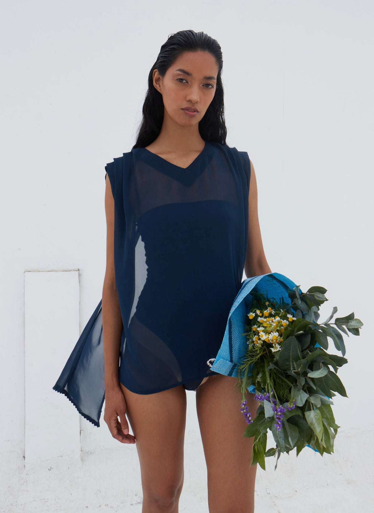 Navy sheer Yaku blouse with V-neckline, front view on model